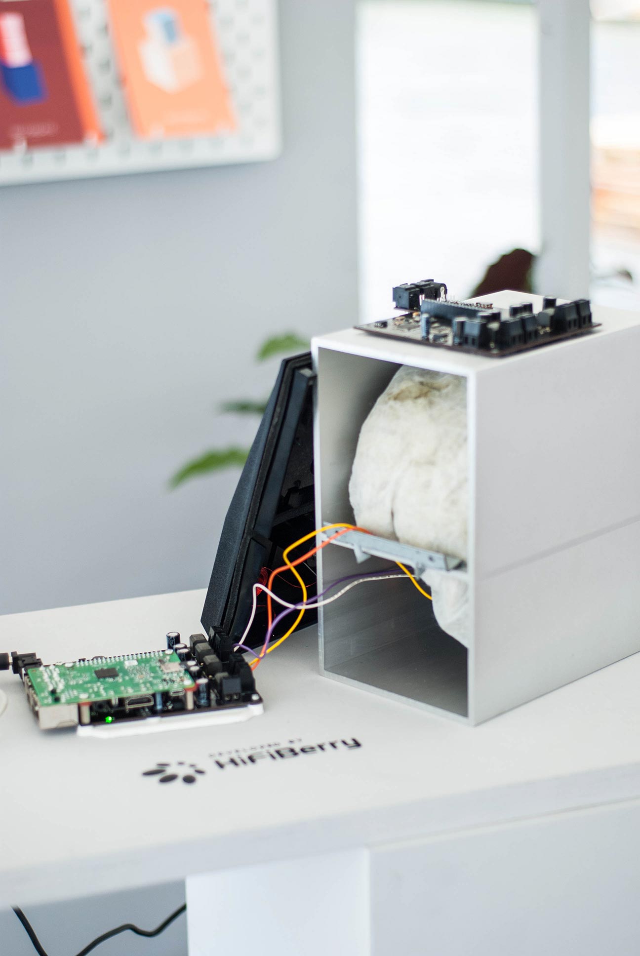 An exploded view of an upcycled loudspeaker